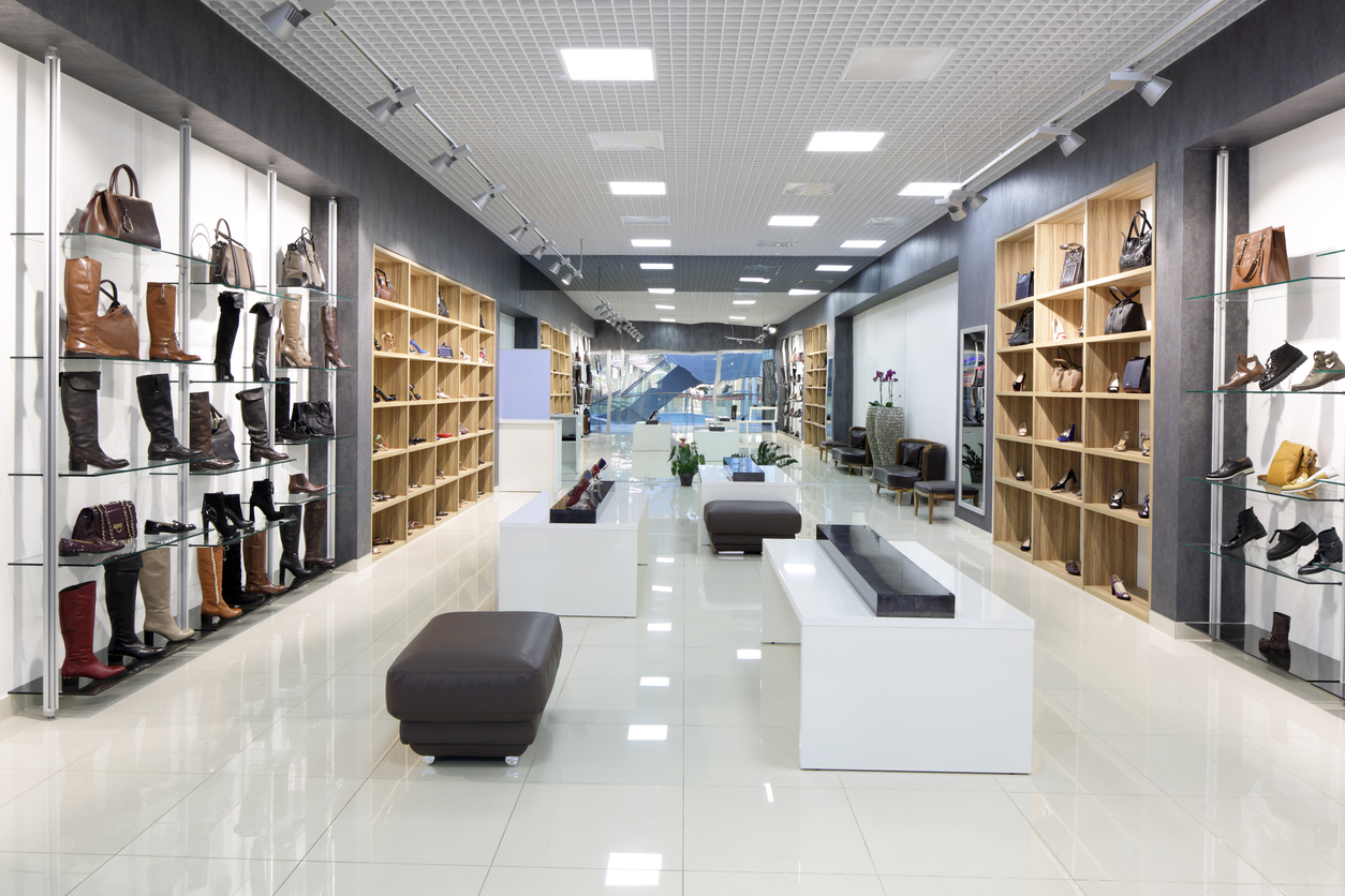 a store with shelves and shoes - daylighting solutions for retail market