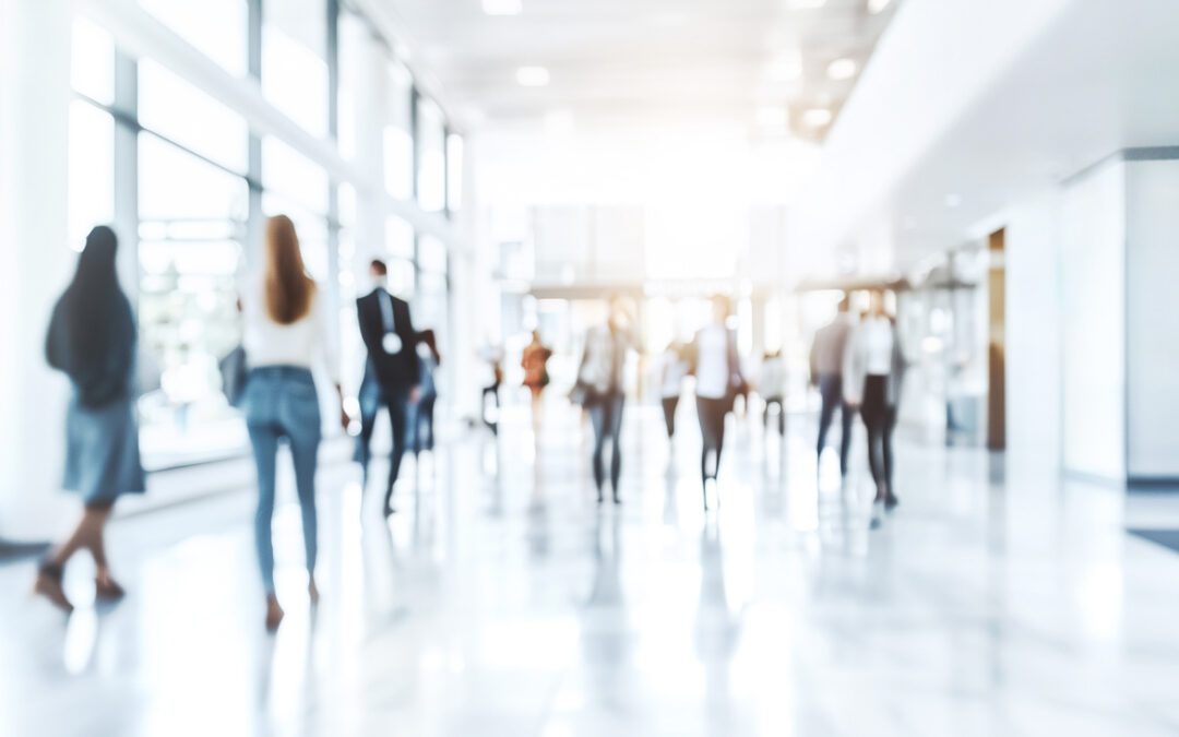 a group of people walking down a hallway - solar daylighting system